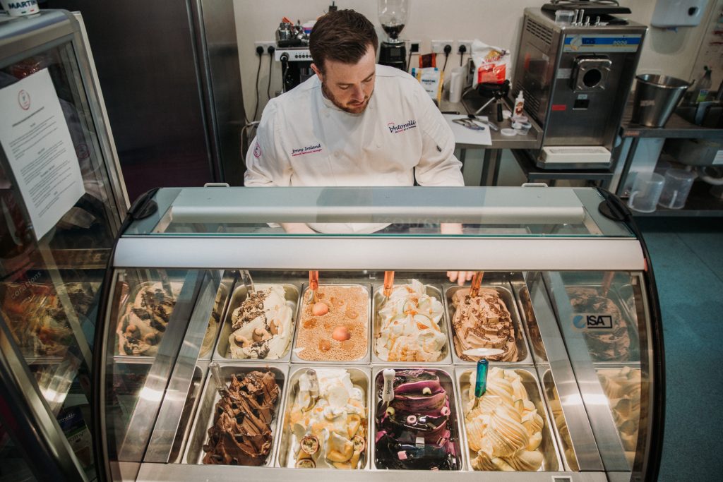 jonny stood next to ice cream cabinet